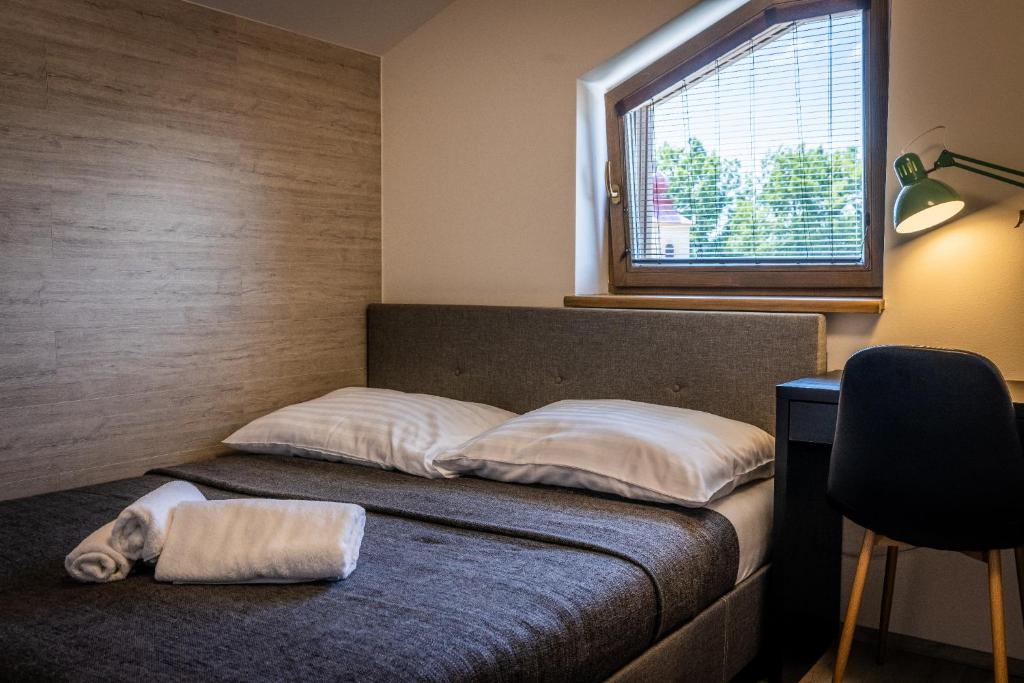Posteľ alebo postele v izbe v ubytovaní Horská Chata Ostružiny