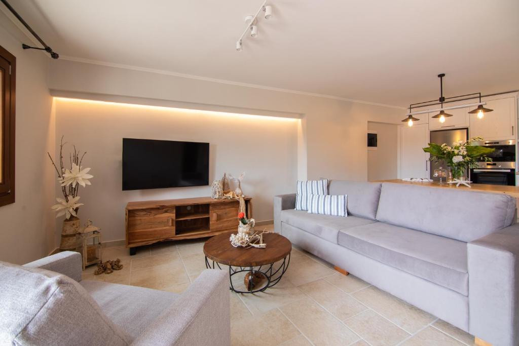 A television and/or entertainment centre at Dimoulias House