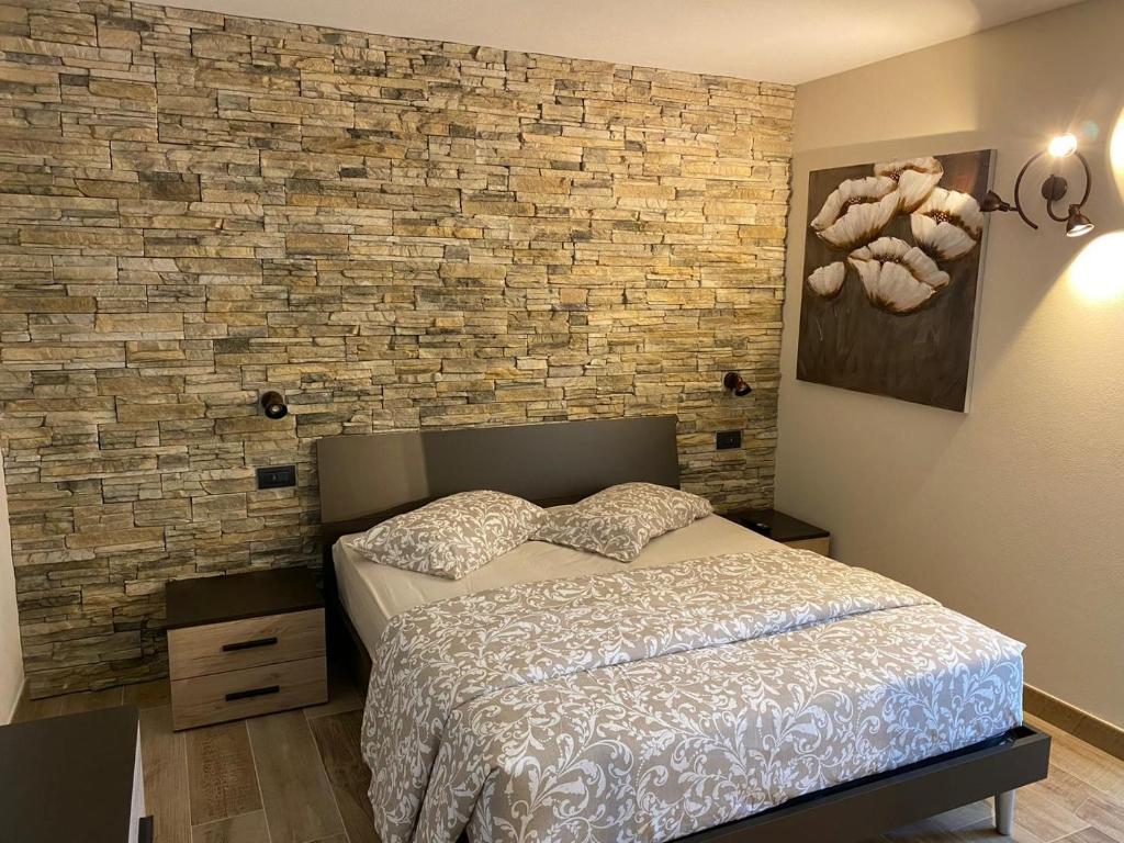 Posteľ alebo postele v izbe v ubytovaní CASA MARTINELLI