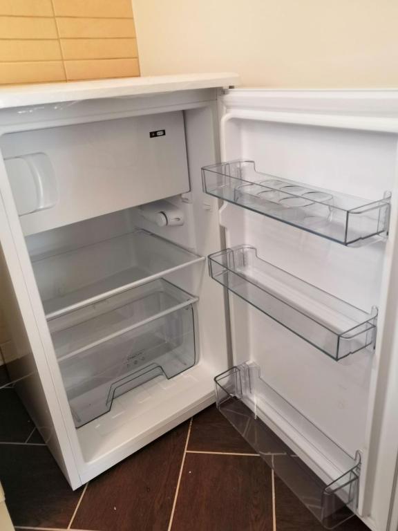 Kuchyňa alebo kuchynka v ubytovaní NewIsland Family Apartman