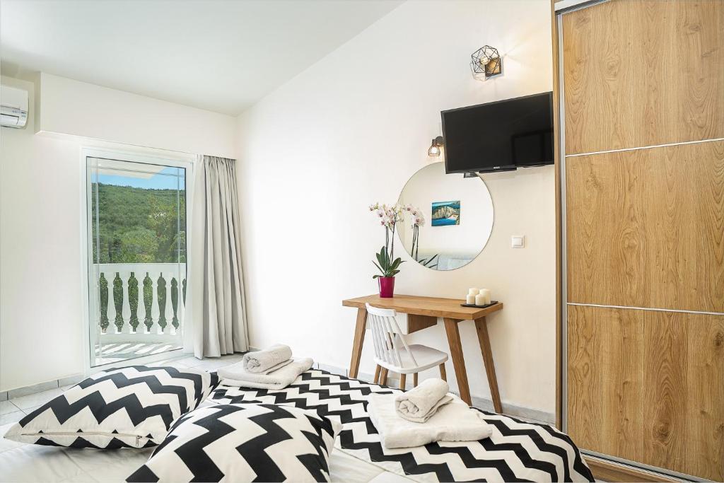 TV o dispositivi per l'intrattenimento presso Sunrise Rent Rooms