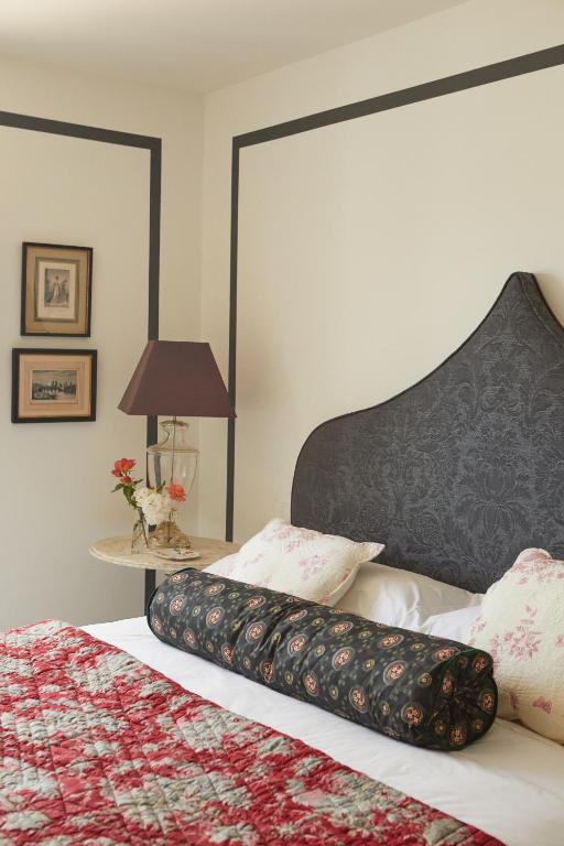 Postel nebo postele na pokoji v ubytování Hotel Caserio Aldeallana