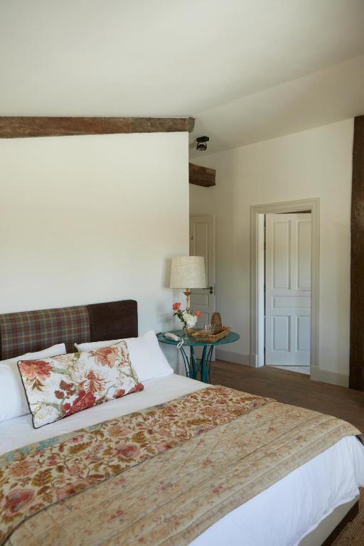 Postel nebo postele na pokoji v ubytování Hotel Caserio Aldeallana
