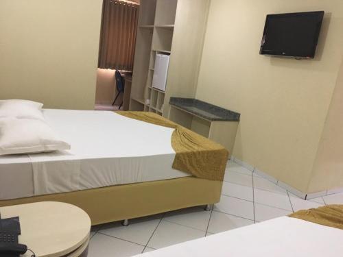TV a/nebo společenská místnost v ubytování King Konfort Hotel