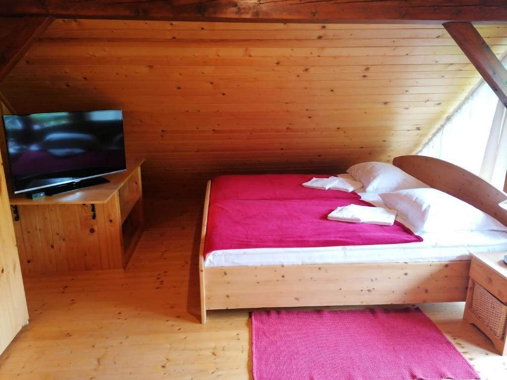 Postel nebo postele na pokoji v ubytování Holiday house apartment Voukov mlin