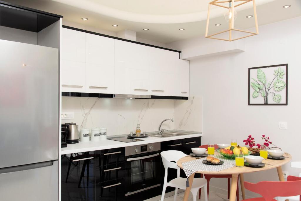 Kuchyň nebo kuchyňský kout v ubytování Elounda Buena Vista Apartments