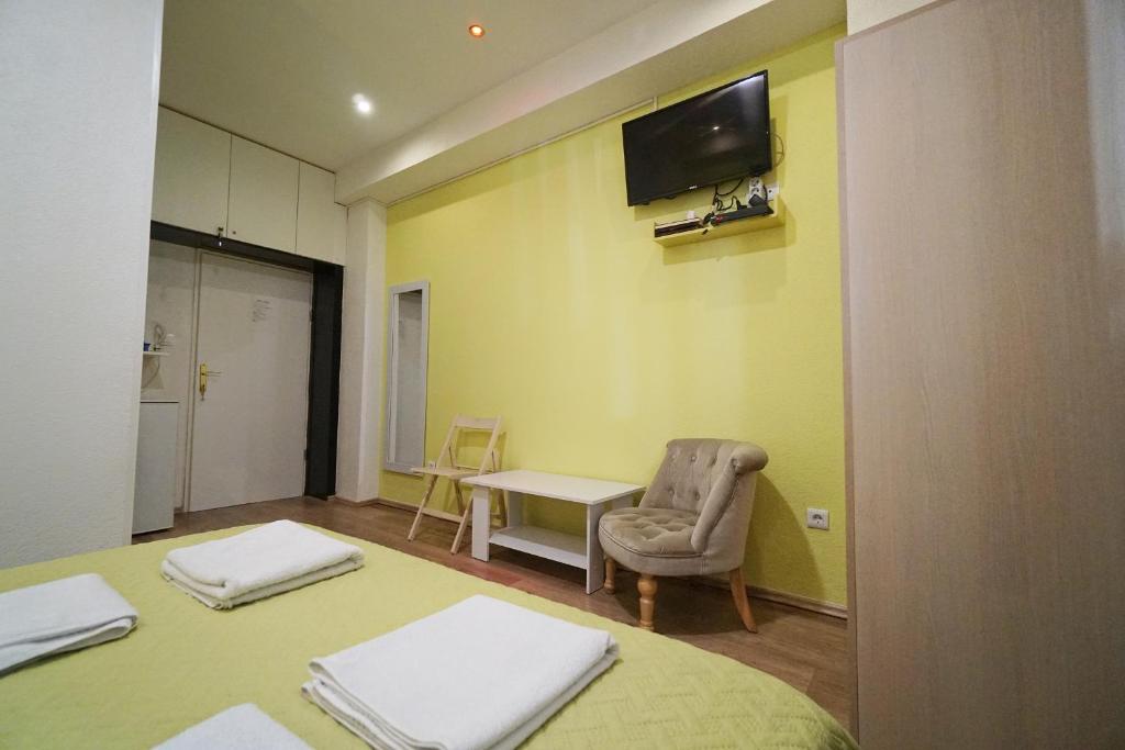 TV a/nebo společenská místnost v ubytování Oasis hostel