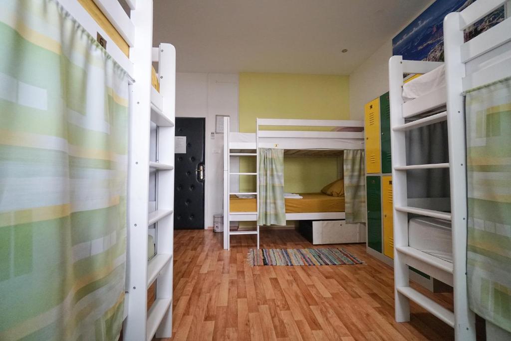 Postel nebo postele na pokoji v ubytování Oasis hostel