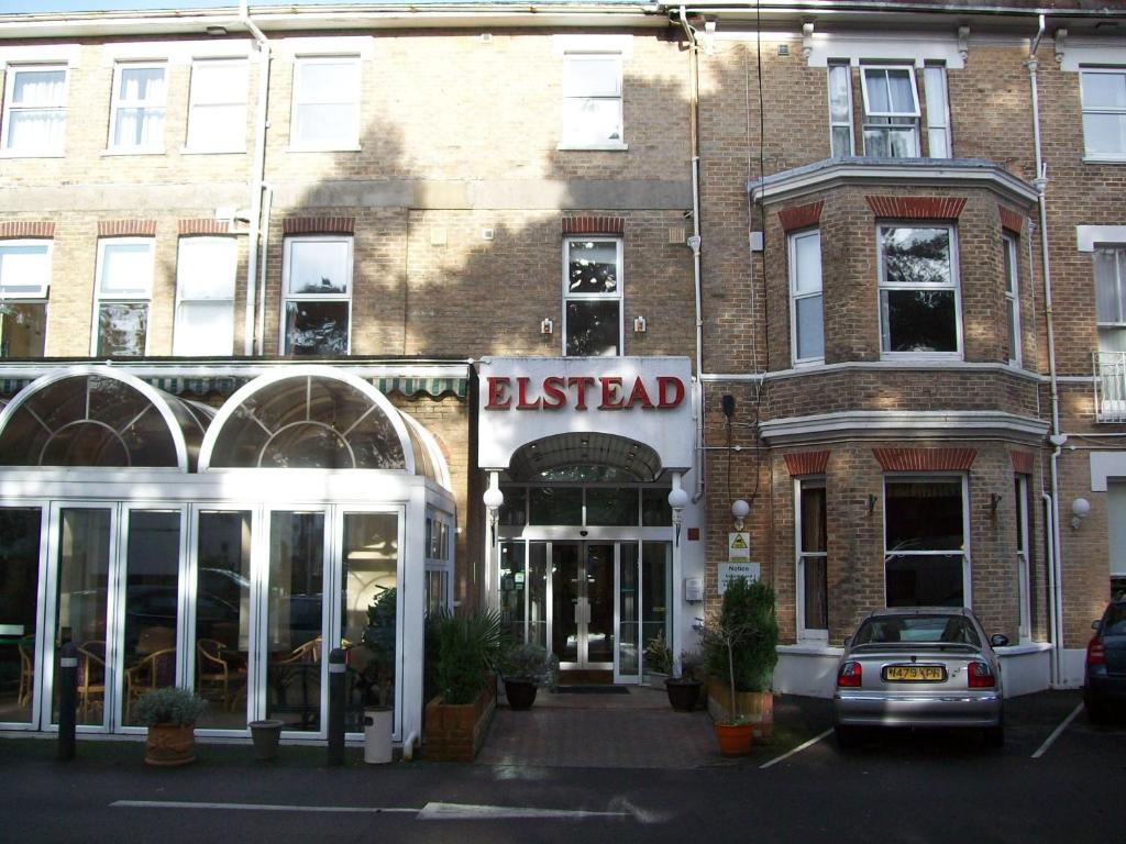 a large building with a sign on the side of it at Elstead Hotel in Bournemouth