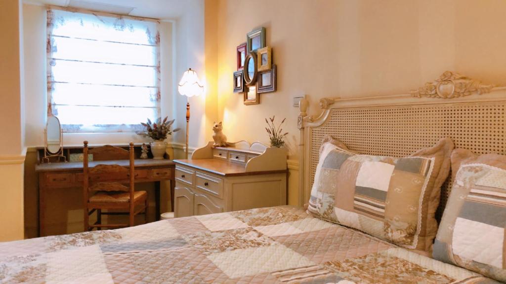 Postel nebo postele na pokoji v ubytování Fazhana Village B&B