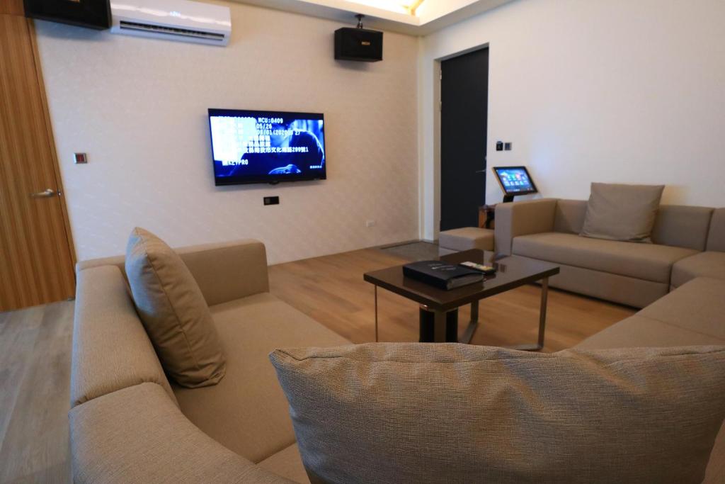 TV a/nebo společenská místnost v ubytování Shu Xin Motel