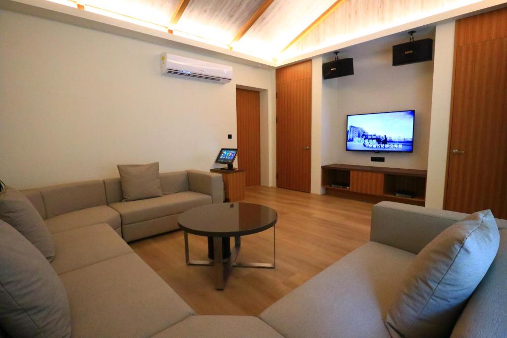 TV a/nebo společenská místnost v ubytování Shu Xin Motel