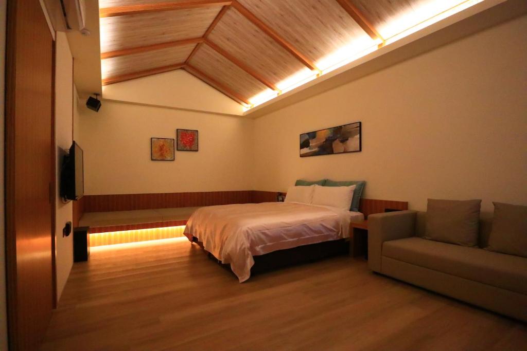 Postel nebo postele na pokoji v ubytování Shu Xin Motel