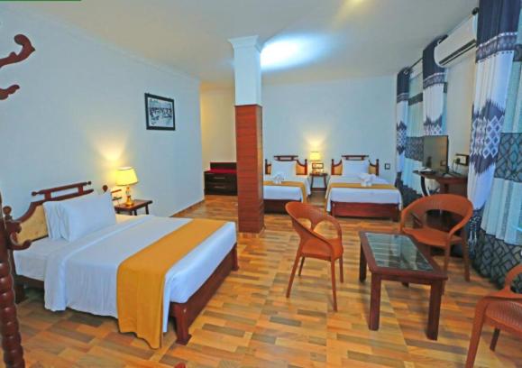 Postel nebo postele na pokoji v ubytování Centauria Hill Resort