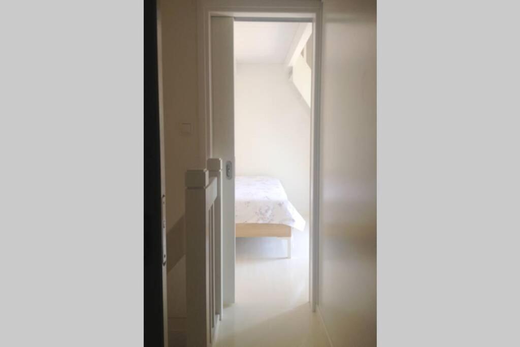 A bed or beds in a room at La Casetta
