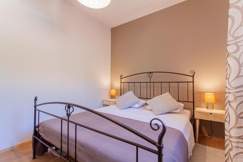 Postel nebo postele na pokoji v ubytování Apartment Leni