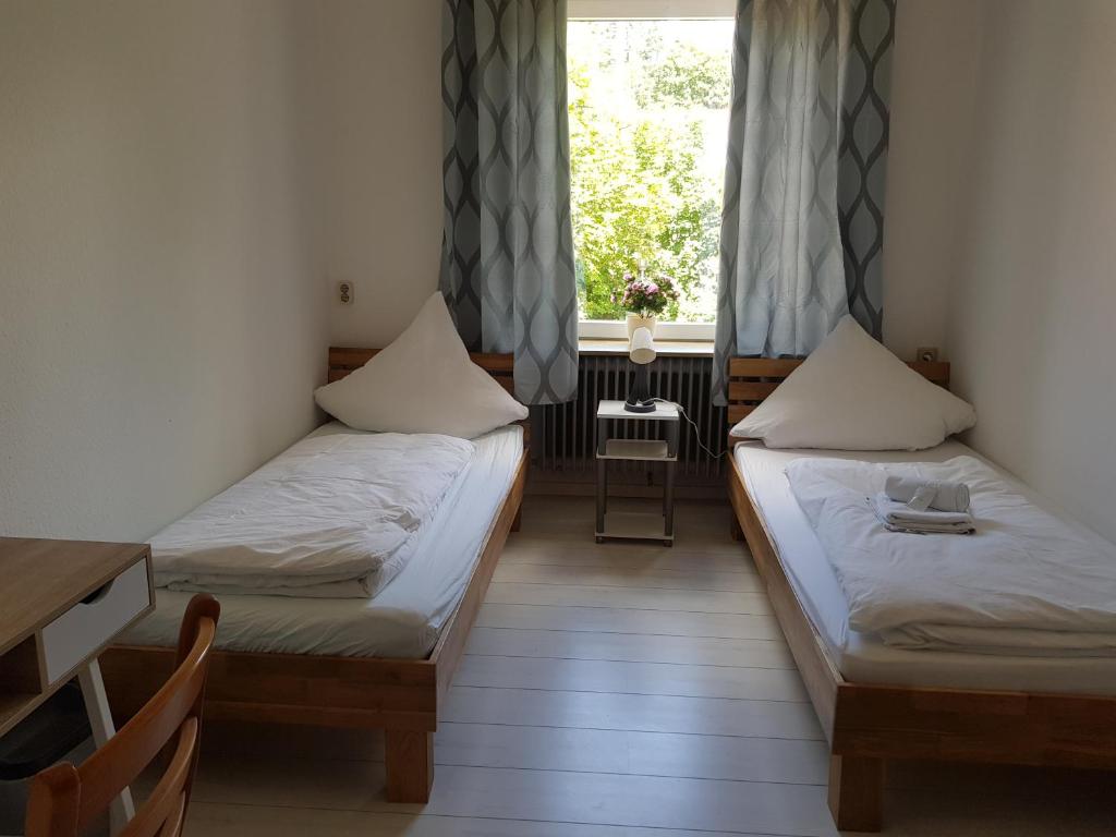 Ein Bett oder Betten in einem Zimmer der Unterkunft Landgasthaus Klosterhof