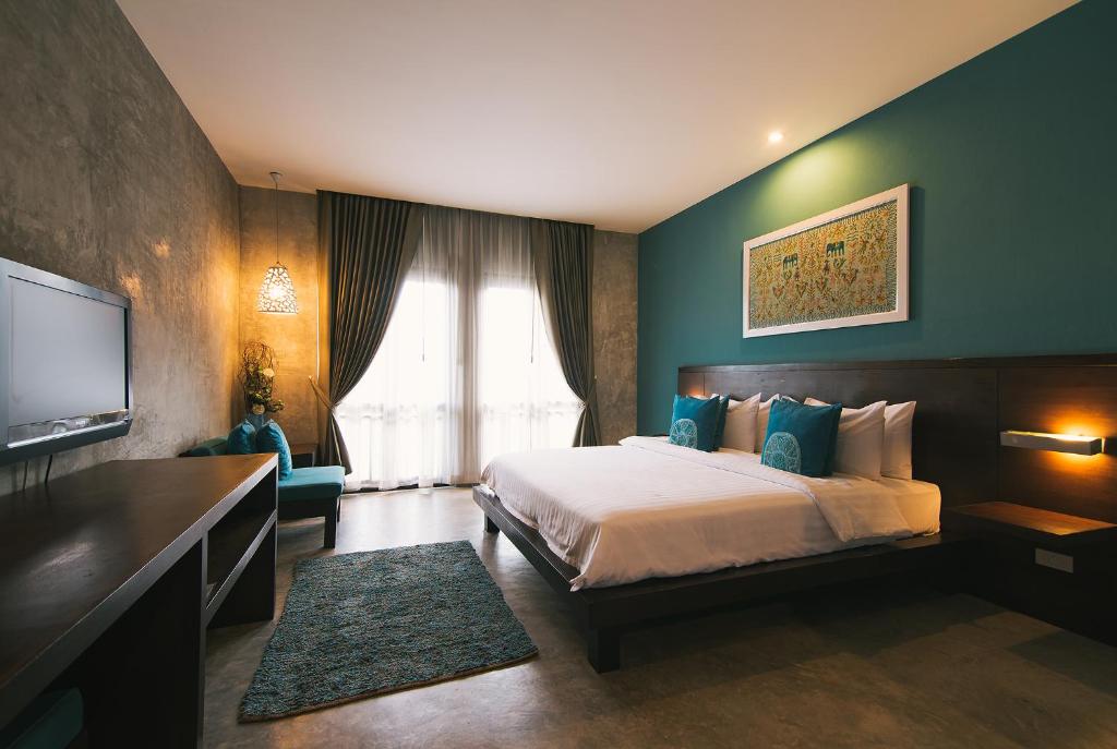 TV a/nebo společenská místnost v ubytování Ketawa Pet Friendly Hotel