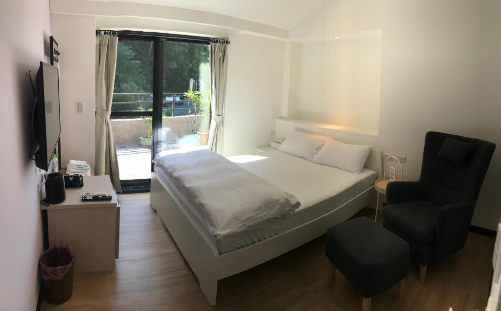 Postel nebo postele na pokoji v ubytování Lucky House B&B