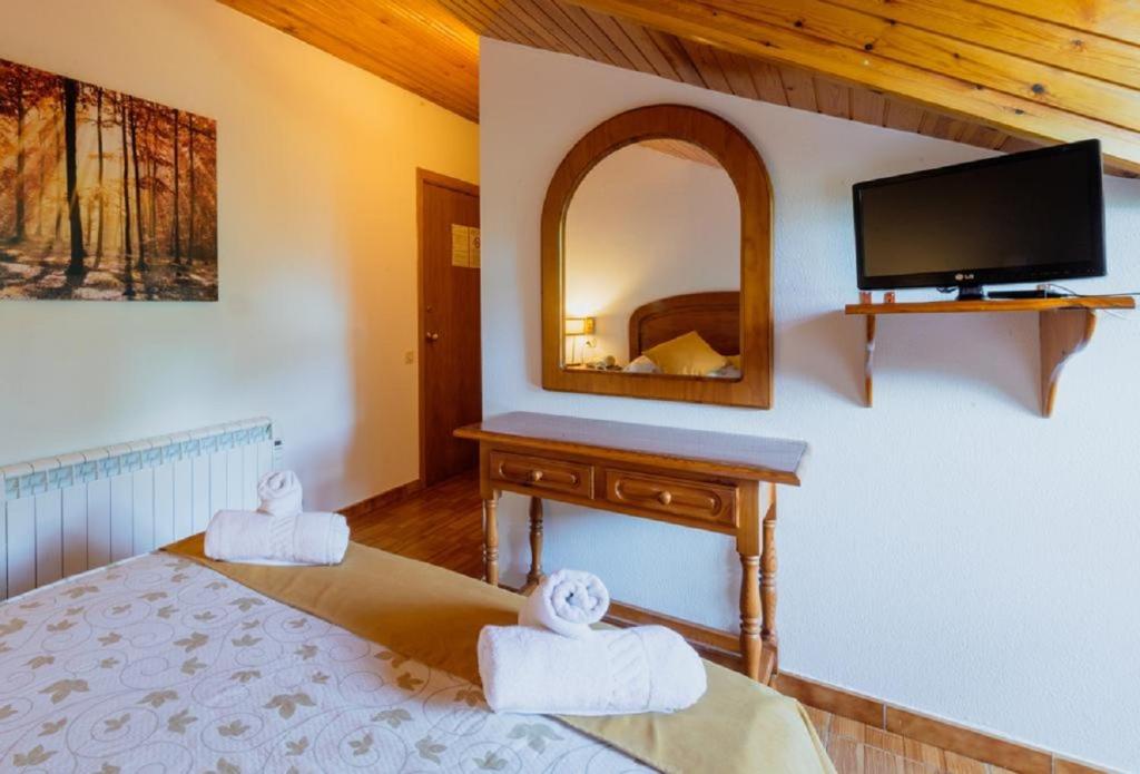 Postel nebo postele na pokoji v ubytování Pey Resort