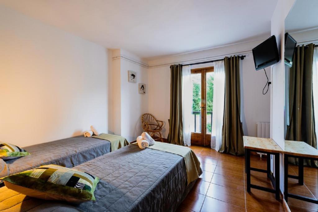 Postel nebo postele na pokoji v ubytování Pey Resort