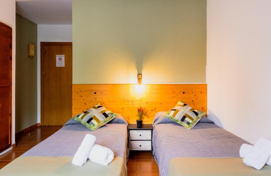 Postel nebo postele na pokoji v ubytování Pey Resort