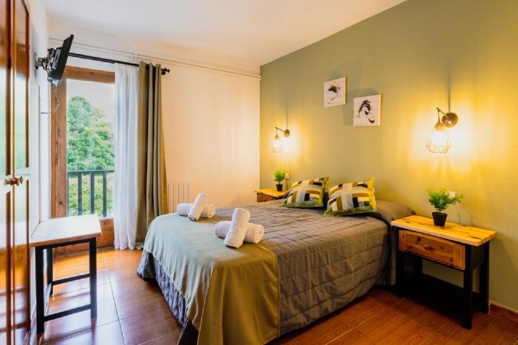 Postel nebo postele na pokoji v ubytování Pey Resort