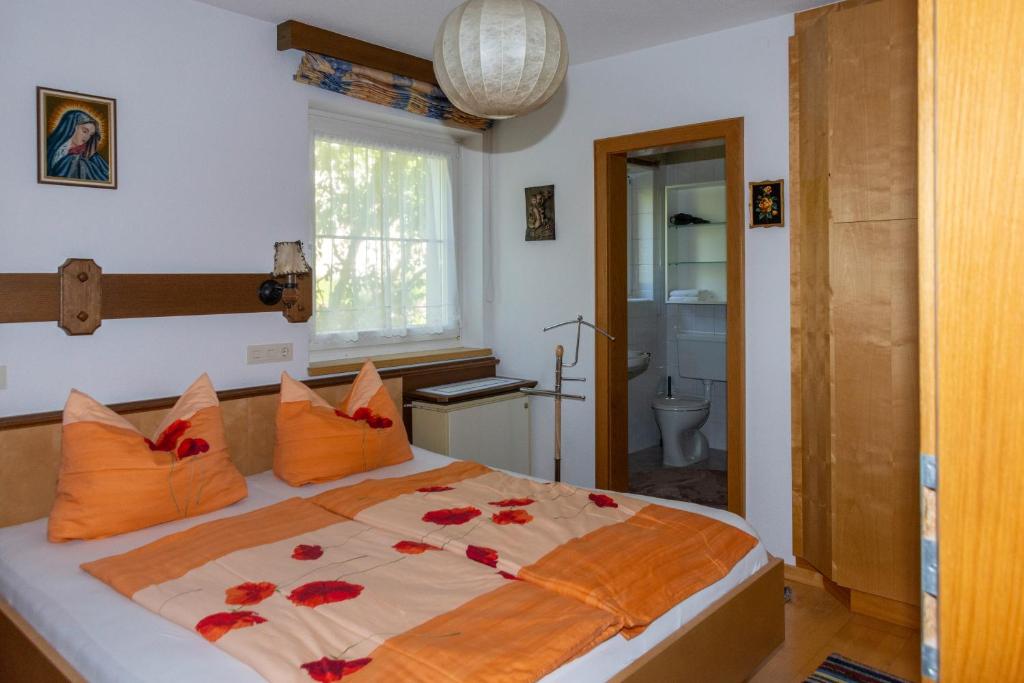 Postel nebo postele na pokoji v ubytování Ferienwohnung Elfriede