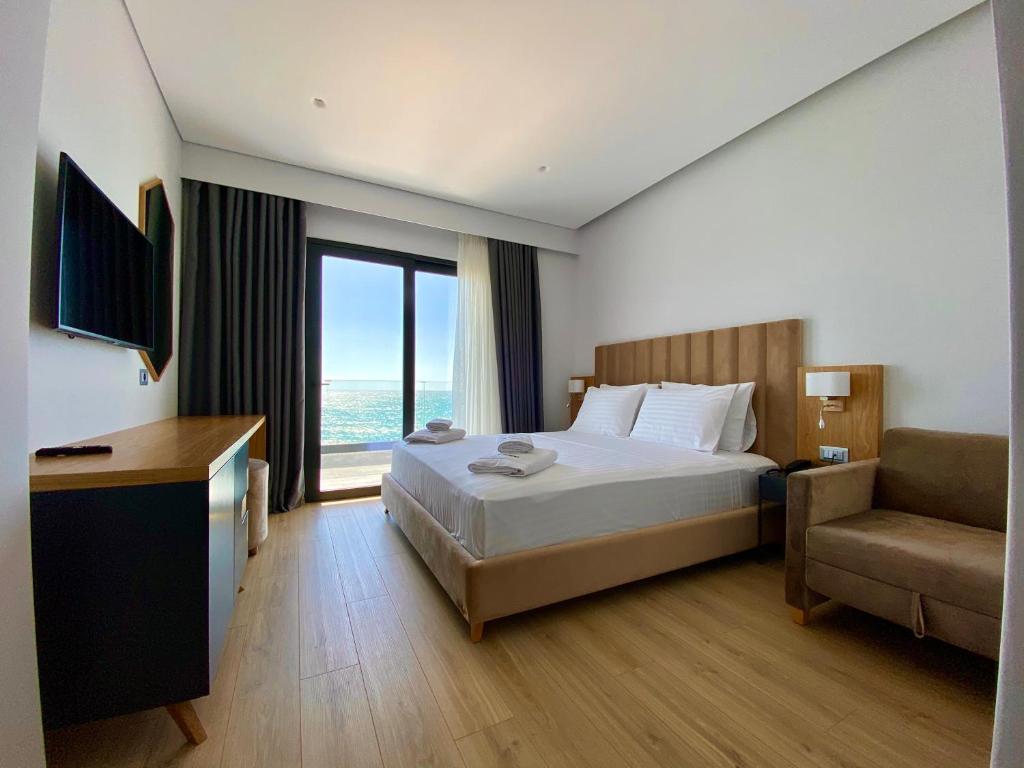 Postel nebo postele na pokoji v ubytování El Primero Hotel