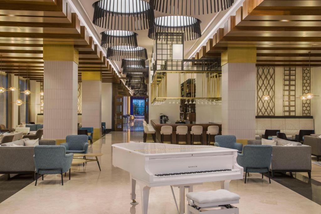 Posezení v ubytování Acanthus Cennet Barut Collection - Ultra All Inclusive
