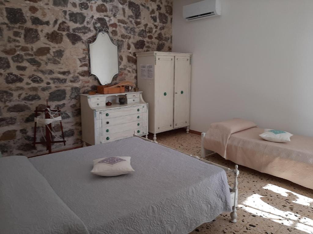 Postel nebo postele na pokoji v ubytování B&B Sa domo de sos Massaios