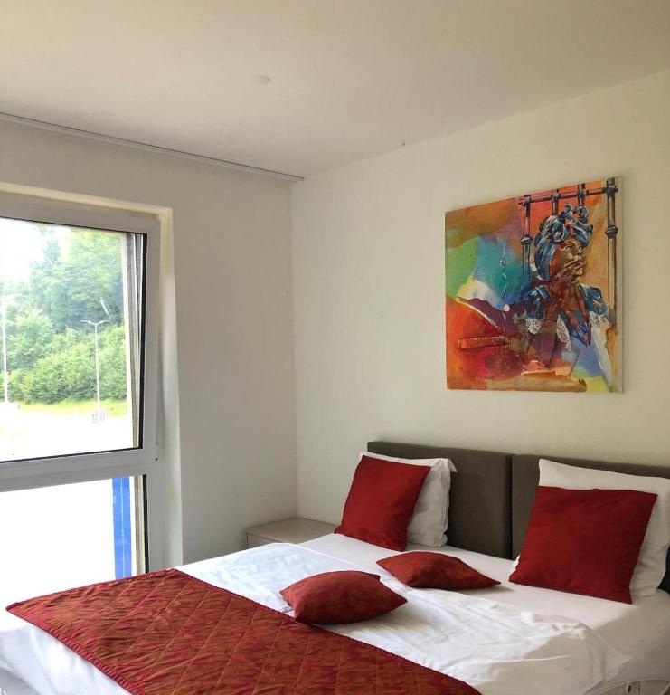 Postel nebo postele na pokoji v ubytování Swiss Star Home