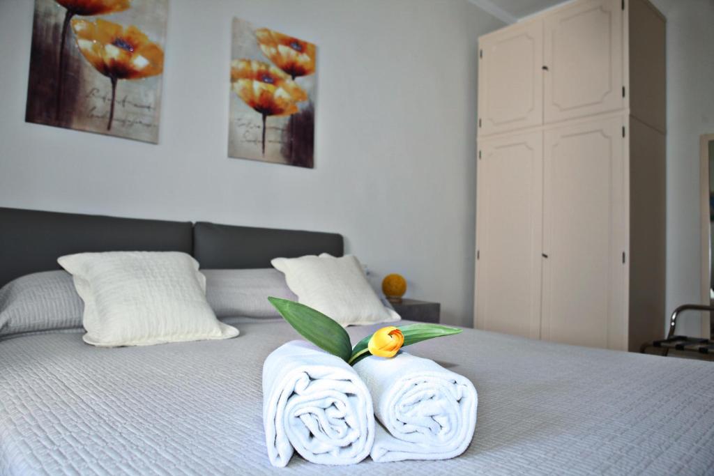 Postel nebo postele na pokoji v ubytování Mura Home Sorrento