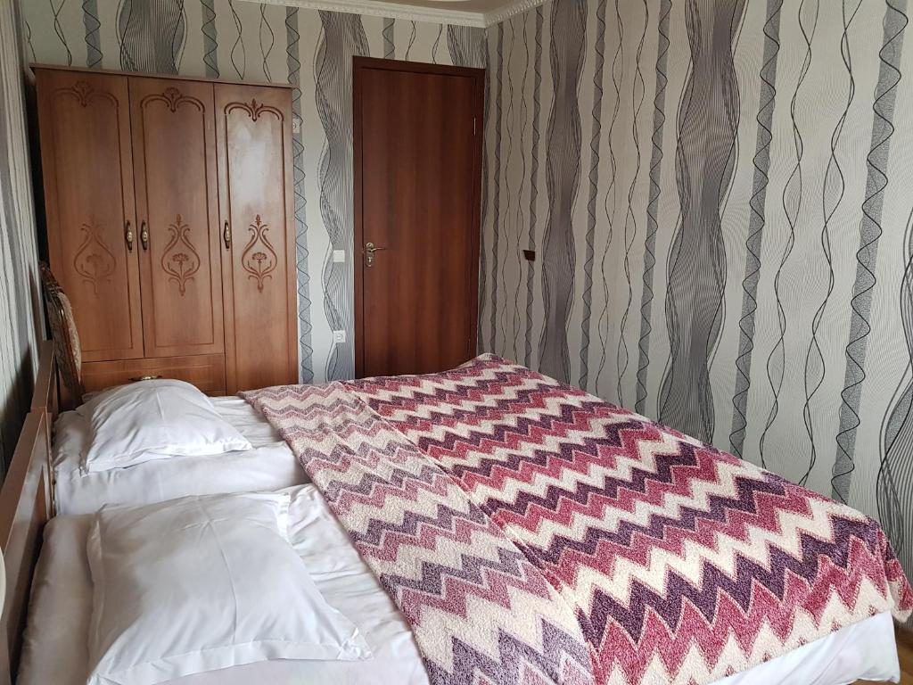 Postel nebo postele na pokoji v ubytování Hilltop Mestia