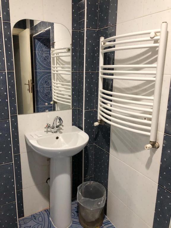 Koupelna v ubytování Kontinent Hotel