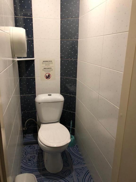 Koupelna v ubytování Kontinent Hotel