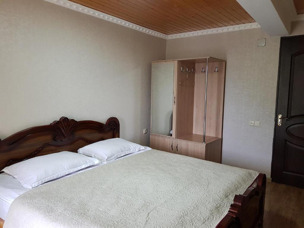 Postel nebo postele na pokoji v ubytování Hilltop Mestia