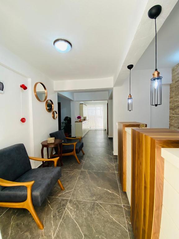 Posezení v ubytování Melisa Hotel