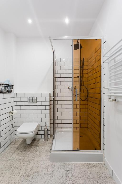 Kúpeľňa v ubytovaní Open Lakes Apartamenty Giżycko
