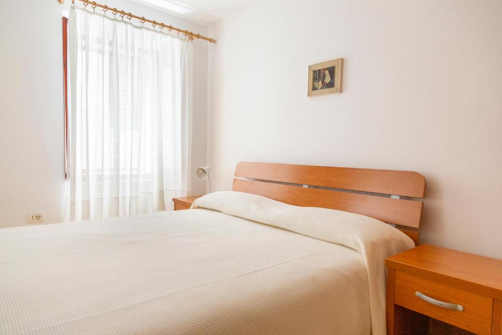 Postel nebo postele na pokoji v ubytování Rooms Anka