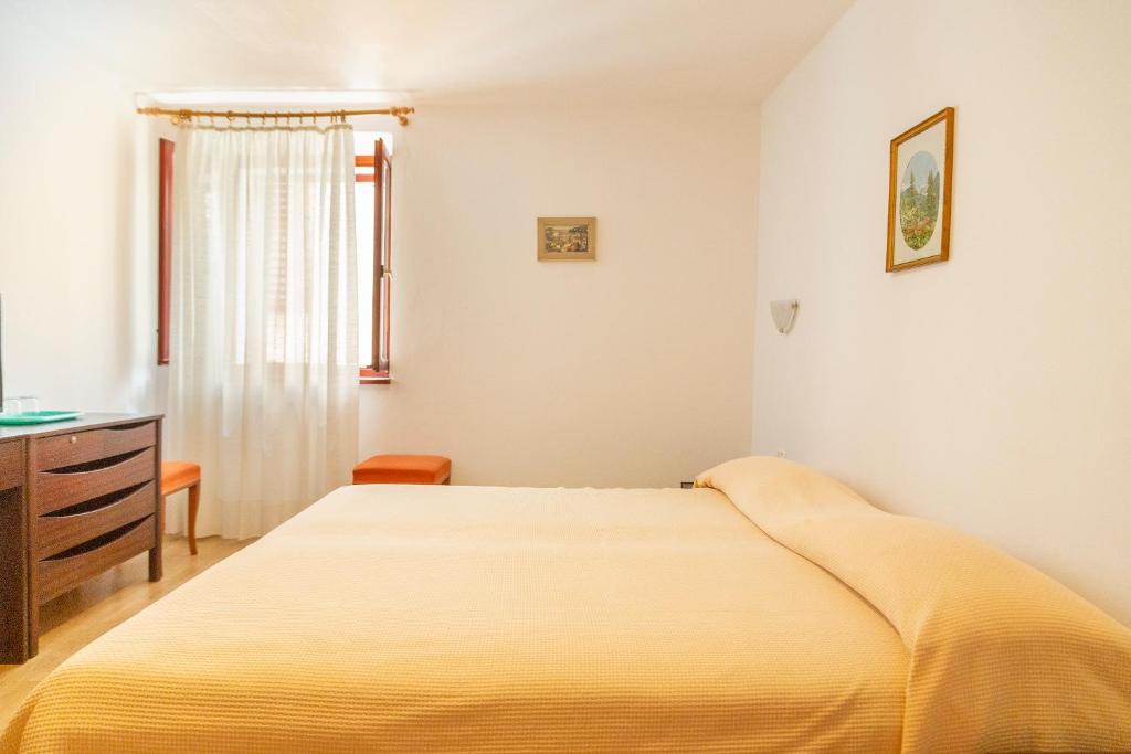 Postel nebo postele na pokoji v ubytování Rooms Anka
