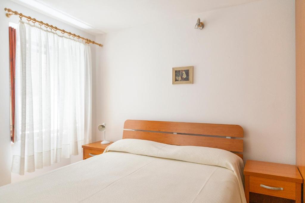 Postel nebo postele na pokoji v ubytování Rooms Anka