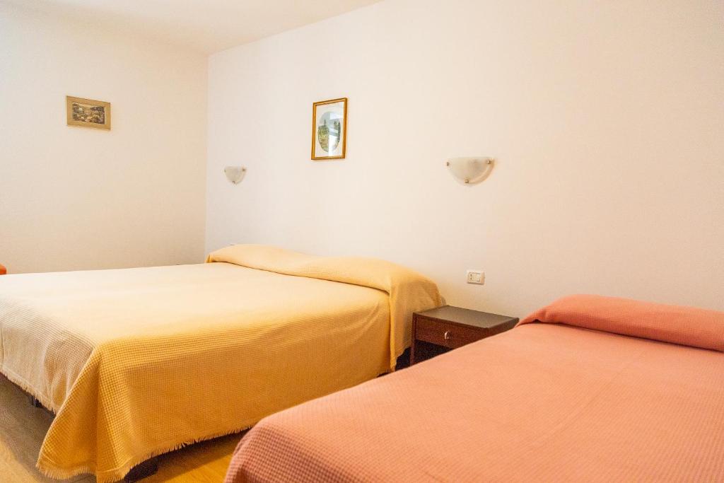 Postel nebo postele na pokoji v ubytování Rooms Anka