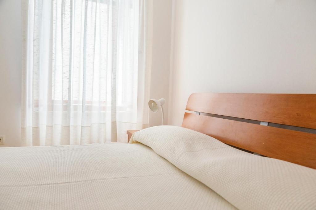 Postel nebo postele na pokoji v ubytování Rooms Anka