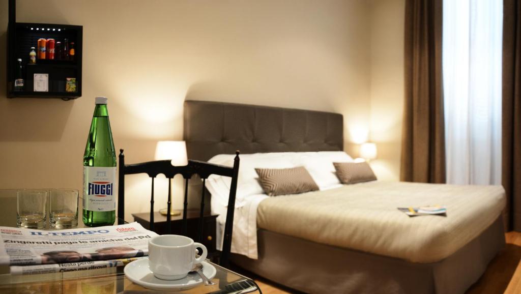 Postel nebo postele na pokoji v ubytování Hotel Touring Wellness & Beauty