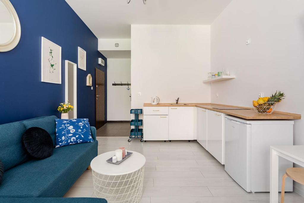 Kuchyňa alebo kuchynka v ubytovaní Open Lakes Apartamenty Giżycko