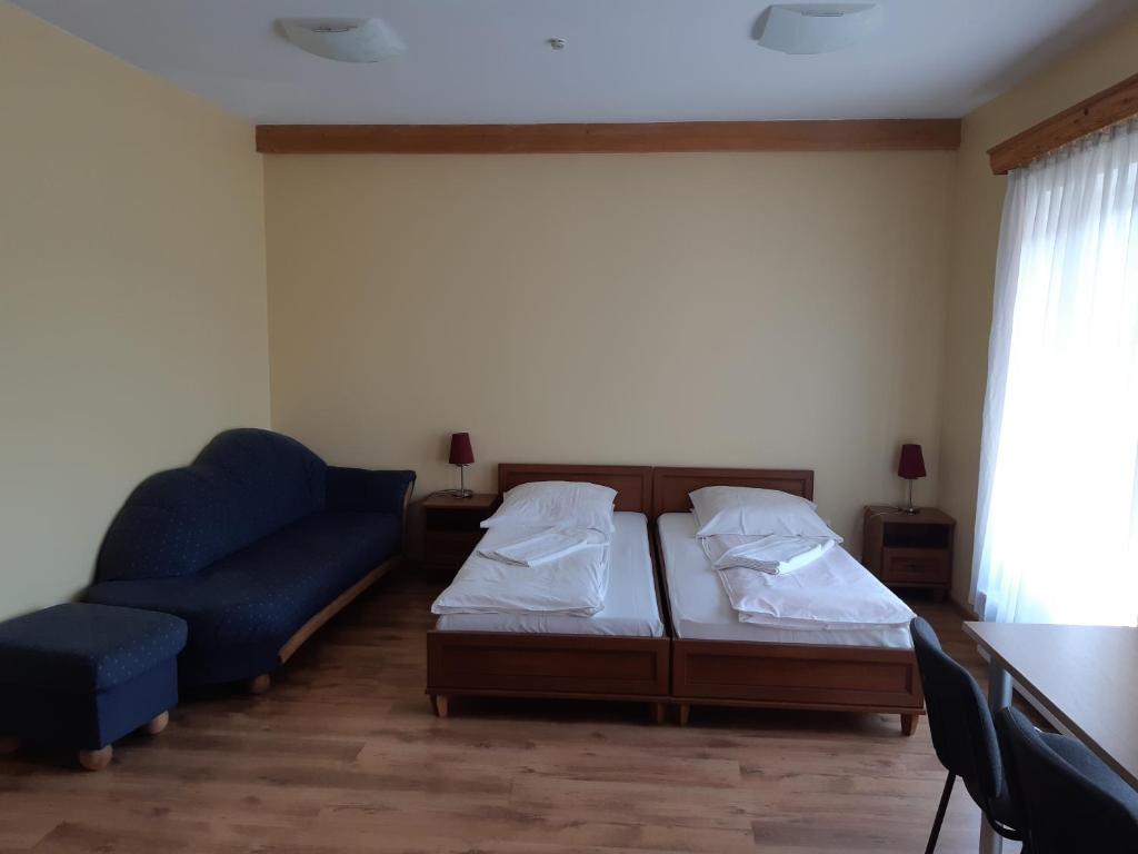 Postel nebo postele na pokoji v ubytování Simon-Dach-Haus