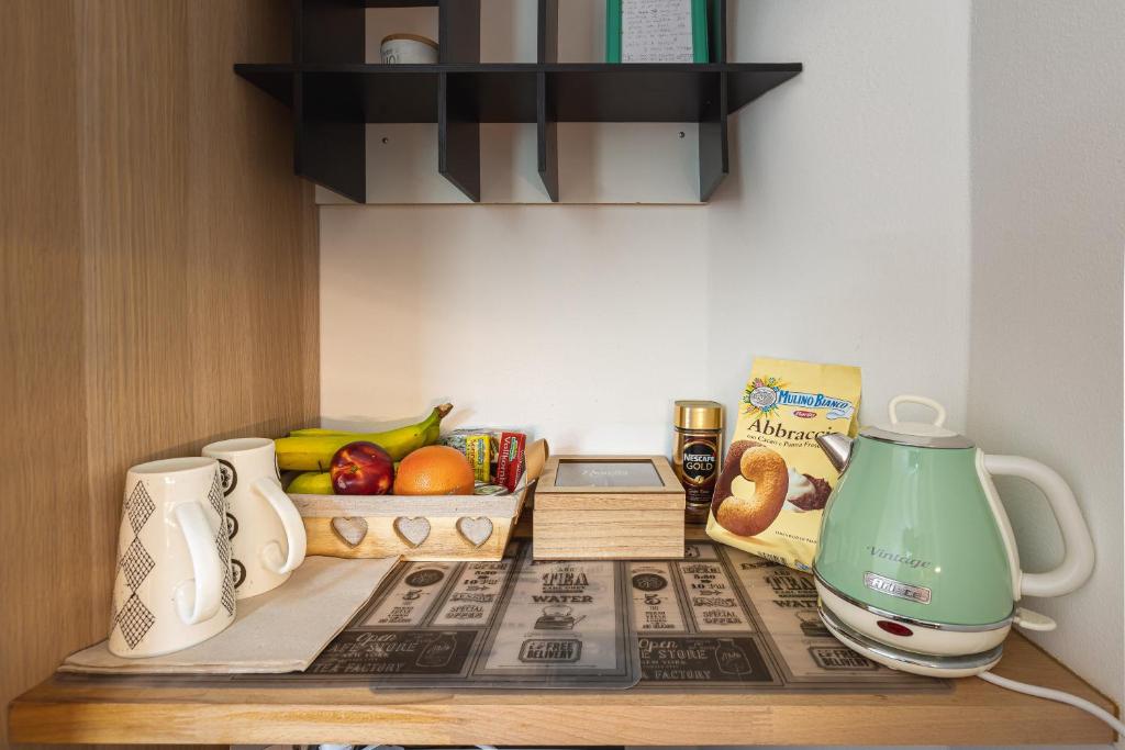 Kuchyň nebo kuchyňský kout v ubytování Le Scuderie B&B