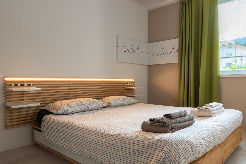 Postel nebo postele na pokoji v ubytování Le Scuderie B&B