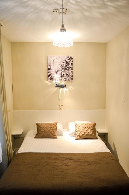 Postel nebo postele na pokoji v ubytování Family Hotel Kooyk